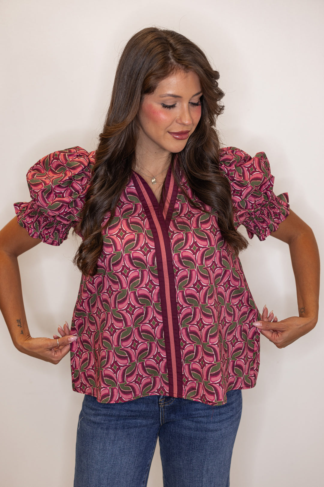 Women's burgundy wine poplin top with abstract print by Entro showing true to size fit