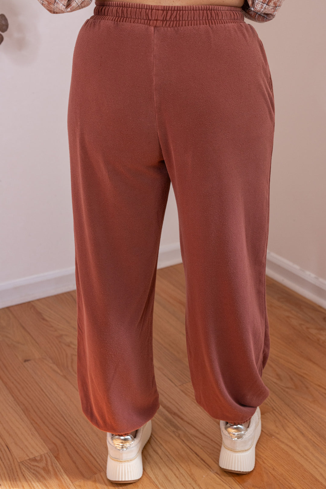 Women's washed terra-cotta terry knit wide leg jogger pants by Blu Pepper showing up close back view