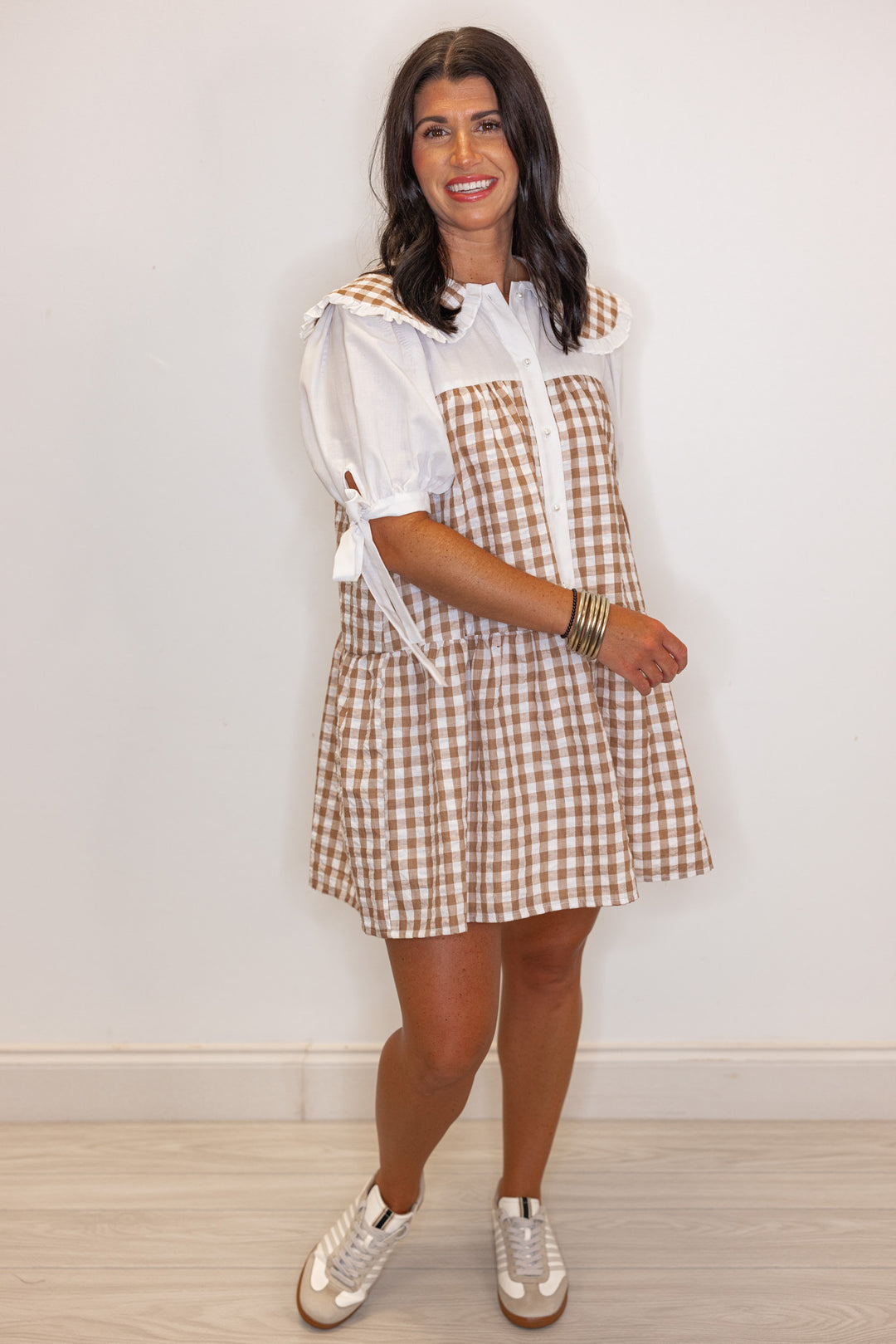 Brown and off white textured gingham print button front tiered babydoll dress by Fantastic Fawn showing relaxed silhouette