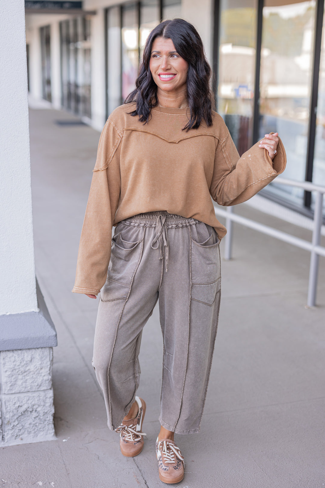 Women's trendy mineral washed caramel terry knit pullover with raw/reverse seam details by Easel