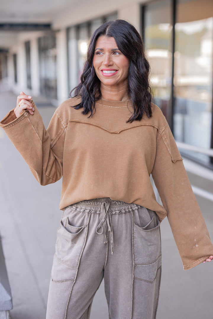 Women's mineral washed caramel terry knit pullover with raw/reverse seam details by Easel