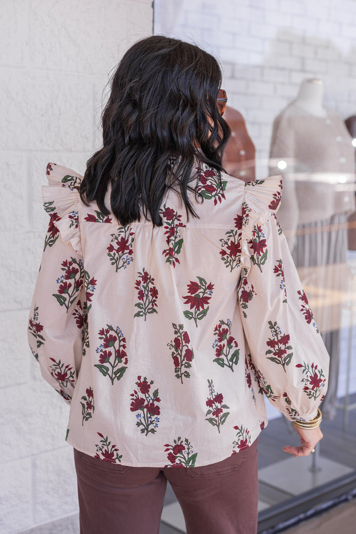 Women's ecru and burgundy floral print babydoll top with pleats and ruffle details by Entro showing back view