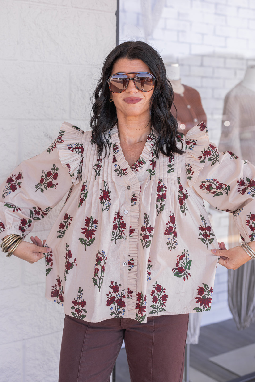 Women's ecru and burgundy floral print babydoll top with pleats and ruffle details by Entro showing relaxed silouhette