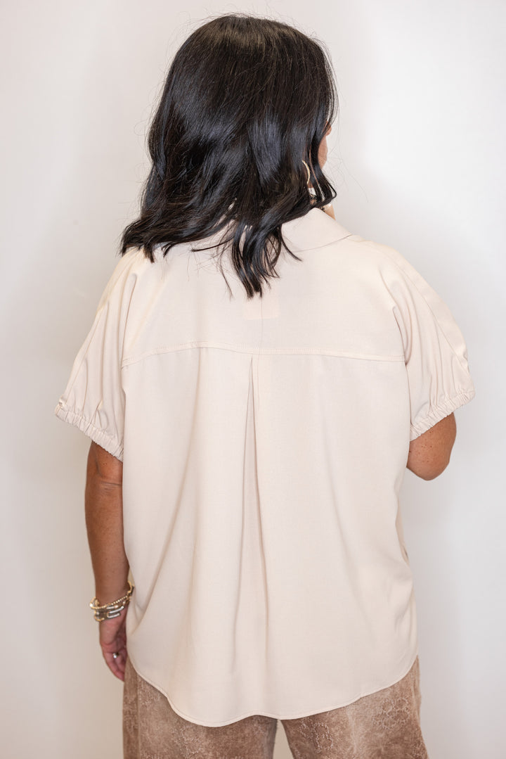 Women's ecru short sleeve top by Entro showing up close back view