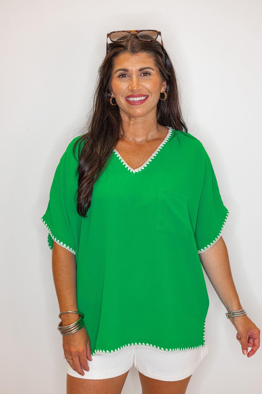 green woven trim relaxed fit top