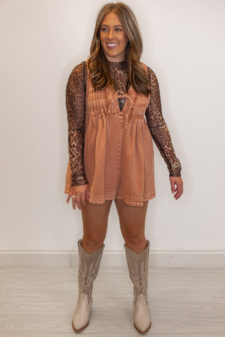 women's fashion rust brown denim tie chest romper paired with ivory western boots