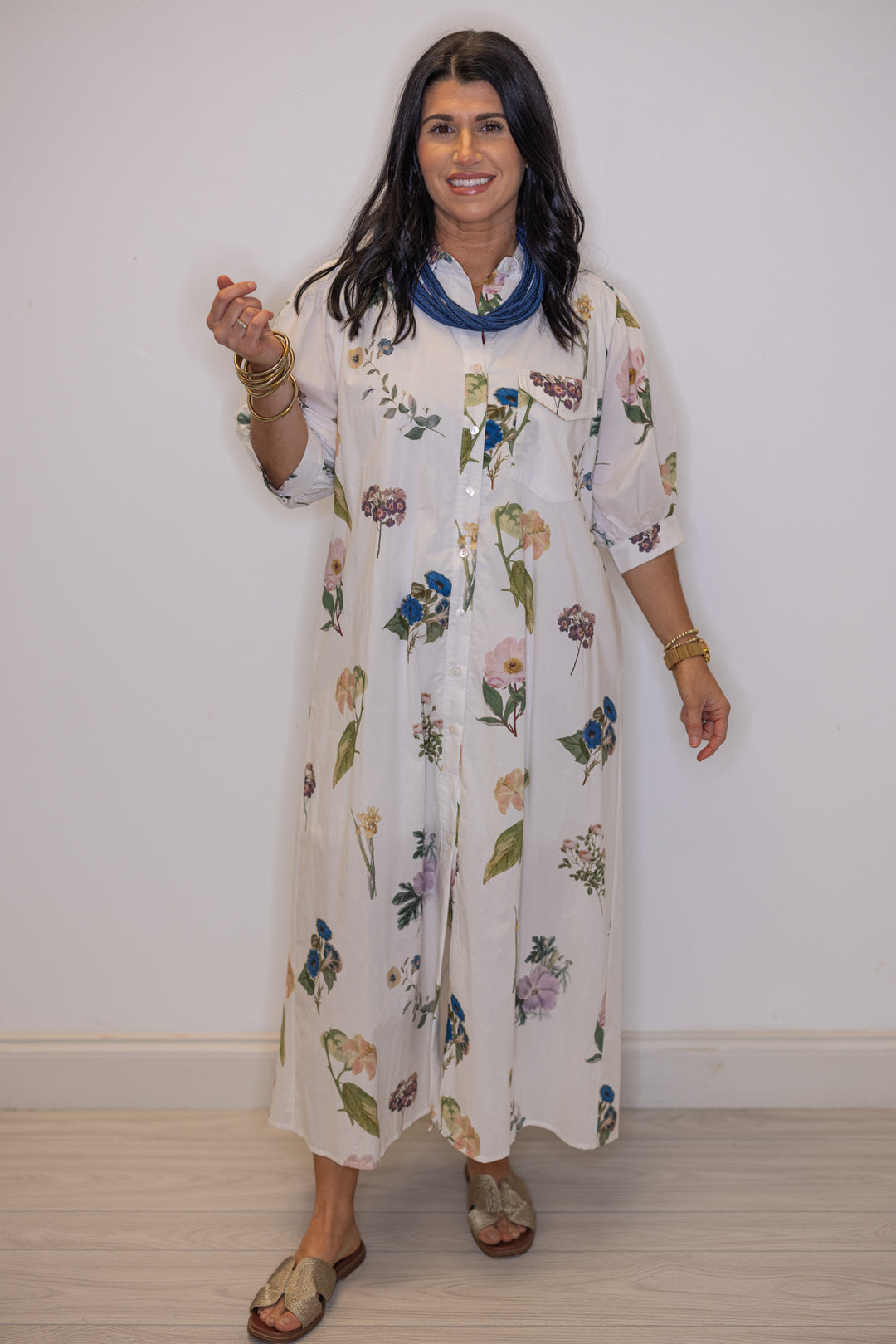 Women's off white floral print button front midi dress by Entro, perfect for Easter