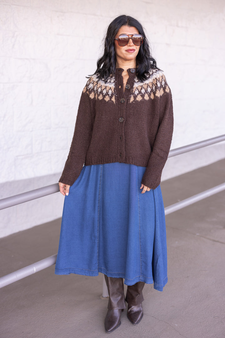 Women's dark blue washed denim chambray midi dress with zip front bodice by Blu Pepper shown styled with an outfit