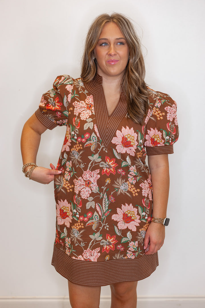 Women's brown multicolor floral print dress with stitching trim detail by Entro showing true to size fit