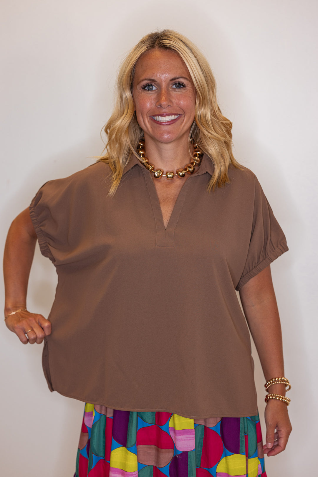 Women's mocha short sleeve top by Entro showing relaxed fit