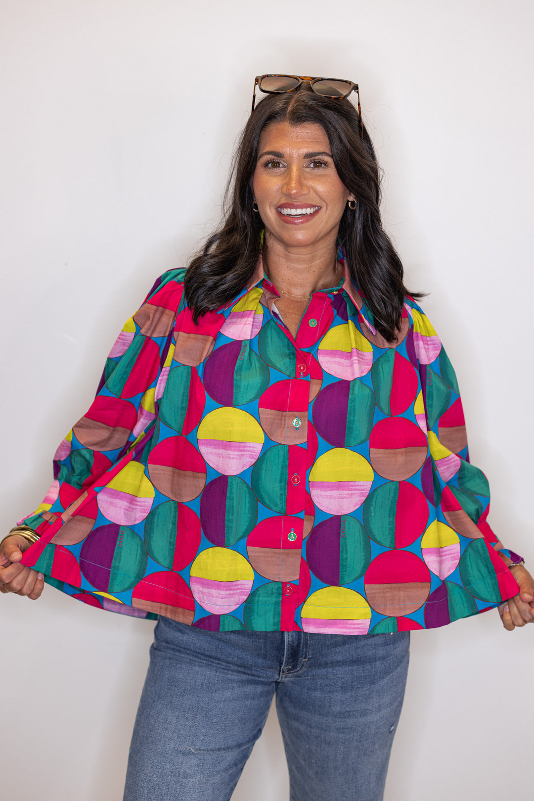 Women's hot pink and multicolor print button front poplin top by Karlie showing relaxed fit