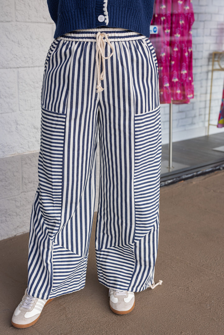 Women's dark blue and cream striped wide leg jogger pants with cinch ankle by &merci