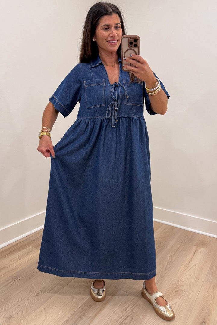 solid dark blue wash denim v neckline bow tie bodice short sleeve relaxed silhouette midi dress