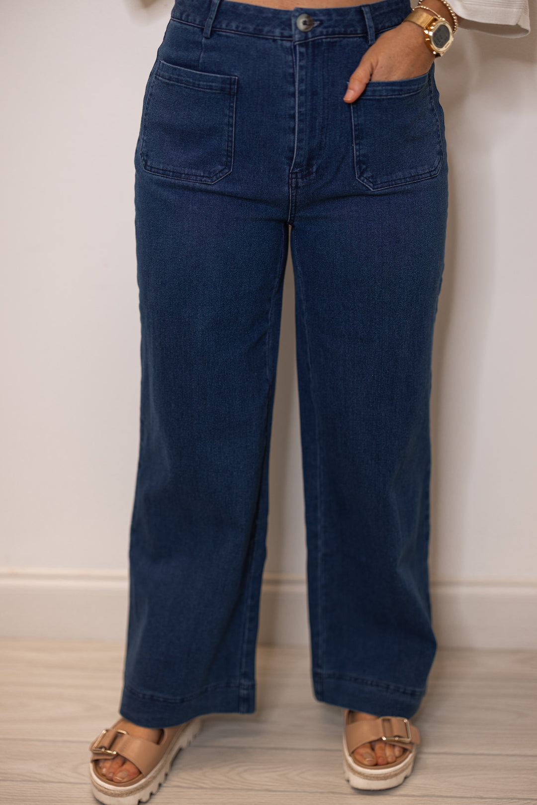 Women's dark washed blue denim wide leg jeans by Entro