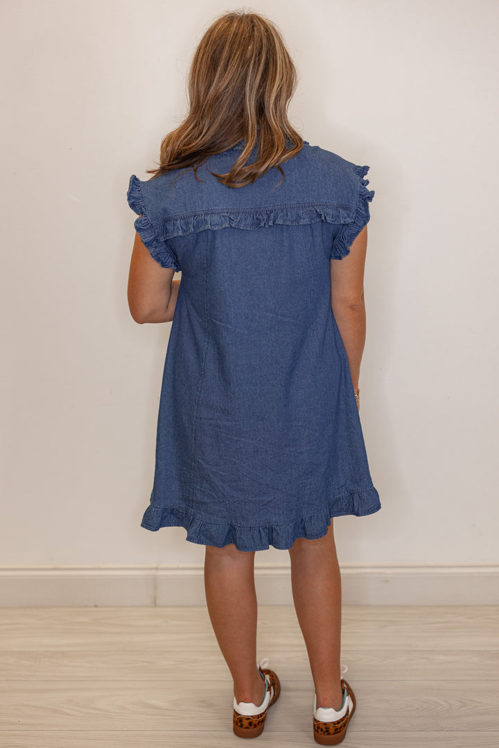 Dark blue denim button down dress with ruffle details by Entro showing full back view