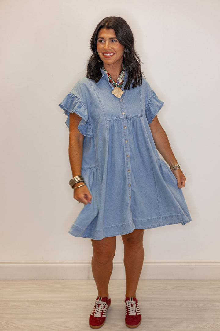 Women's light blue denim button down swing dress by Entro showing relaxed silouhette