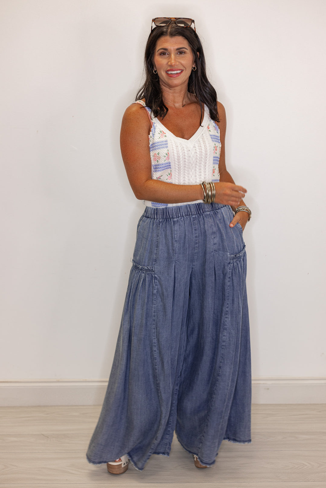 Palazzo style wide leg chambray denim pants in dark blue by Easel showing relaxed fit
