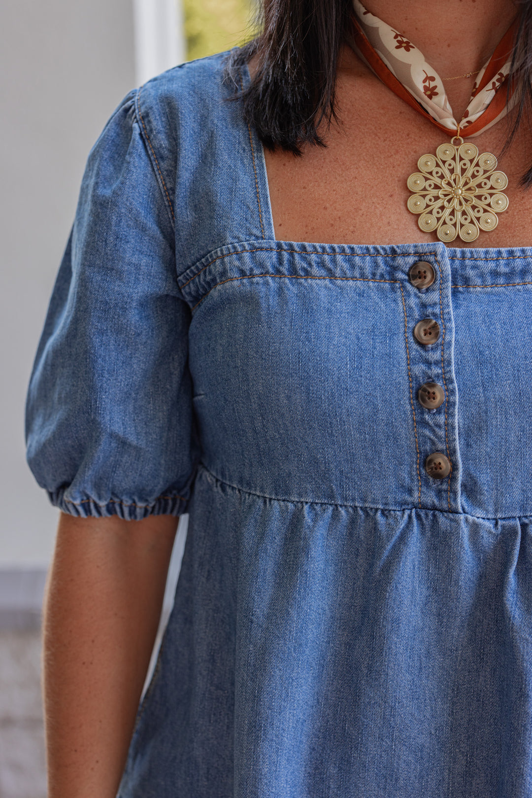 Women's denim puff sleeve dress with button front bodice by Wishlist showing button front bodice