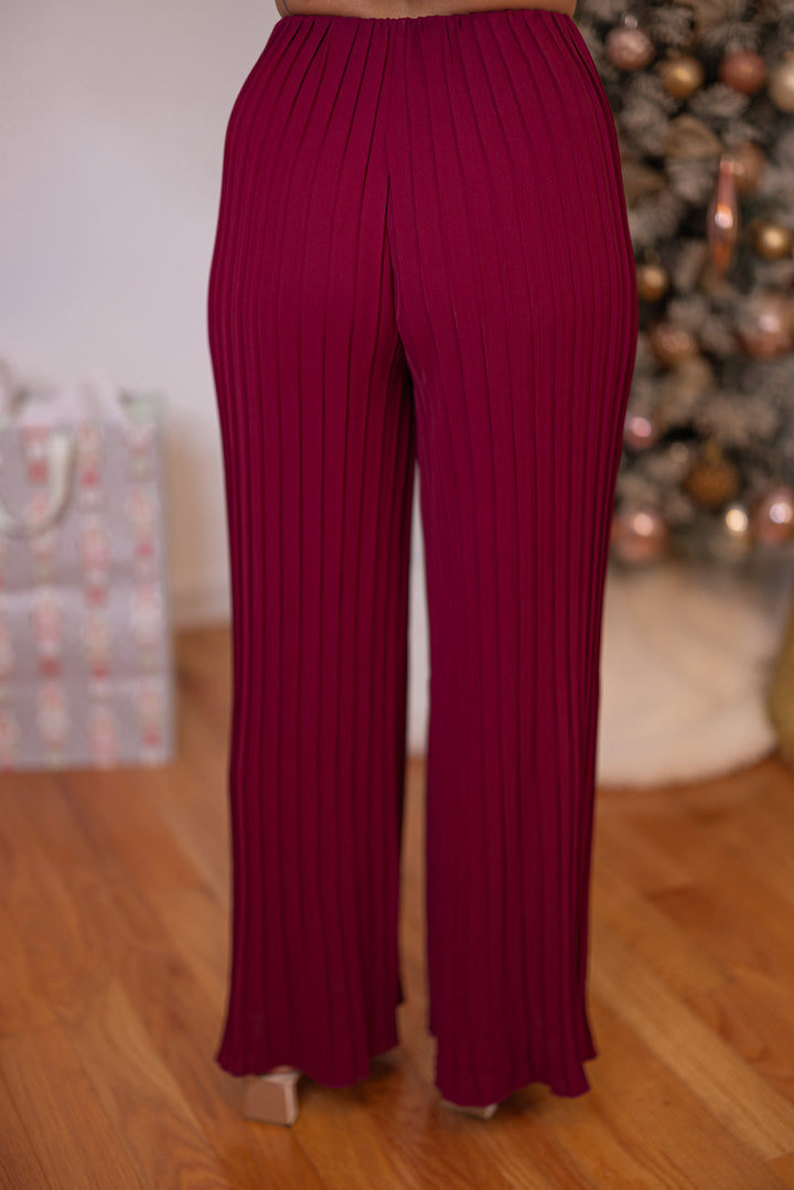 Women's holiday wear burgundy pants set by Wishlist showing up close back view