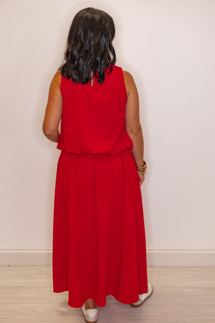 Women's red textured midi skirt with pleats by Entro showing full back view