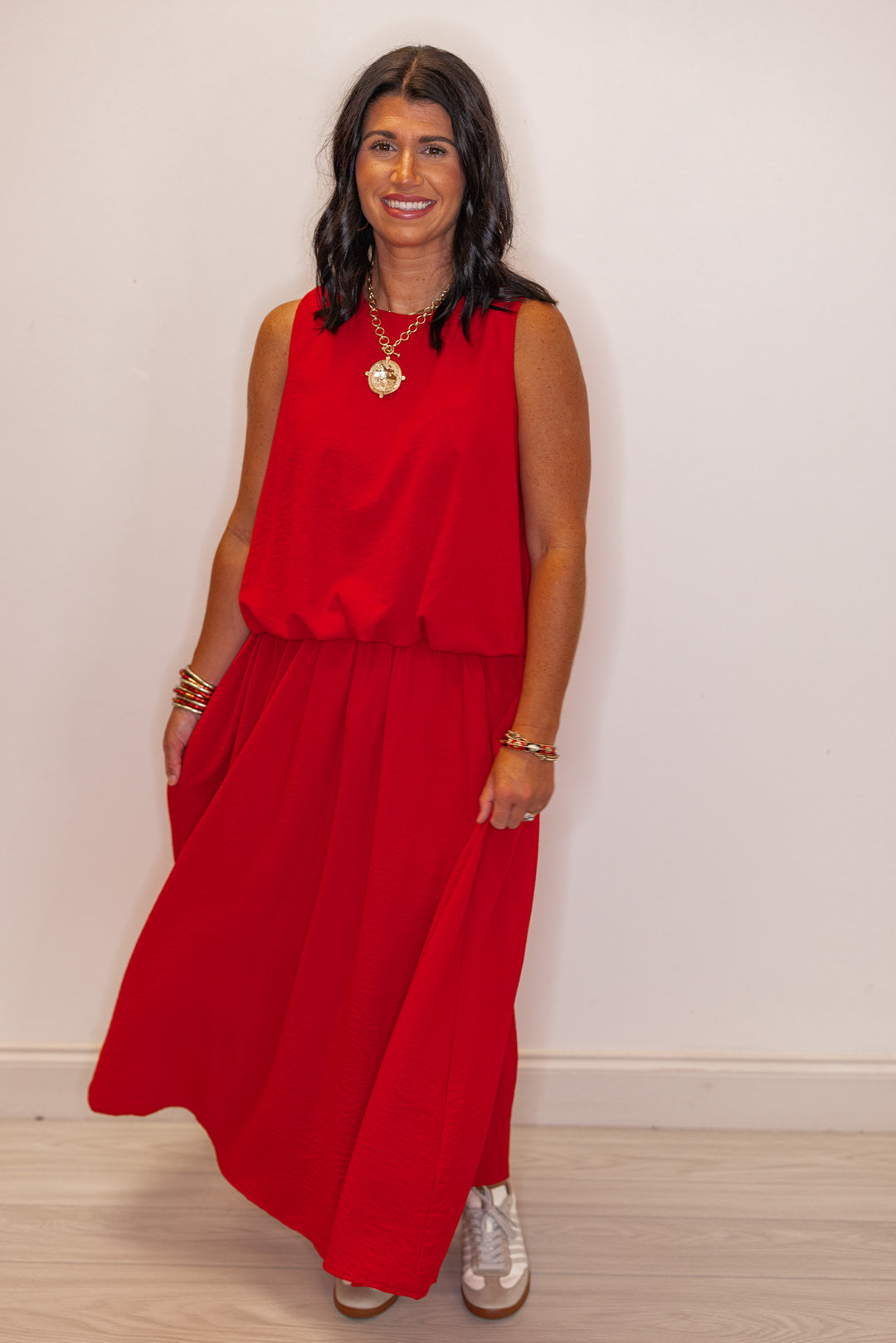 Women's trendy red textured midi skirt with pleats by Entro, perfect for GA gamedays