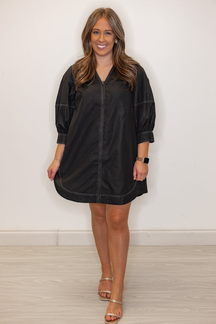 Women's black mini dress with cream contrasting stitching throughout by Entro showing full front view