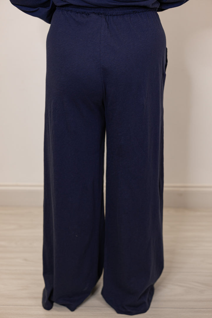 Navy blue wide-leg pants with drawstring waistband