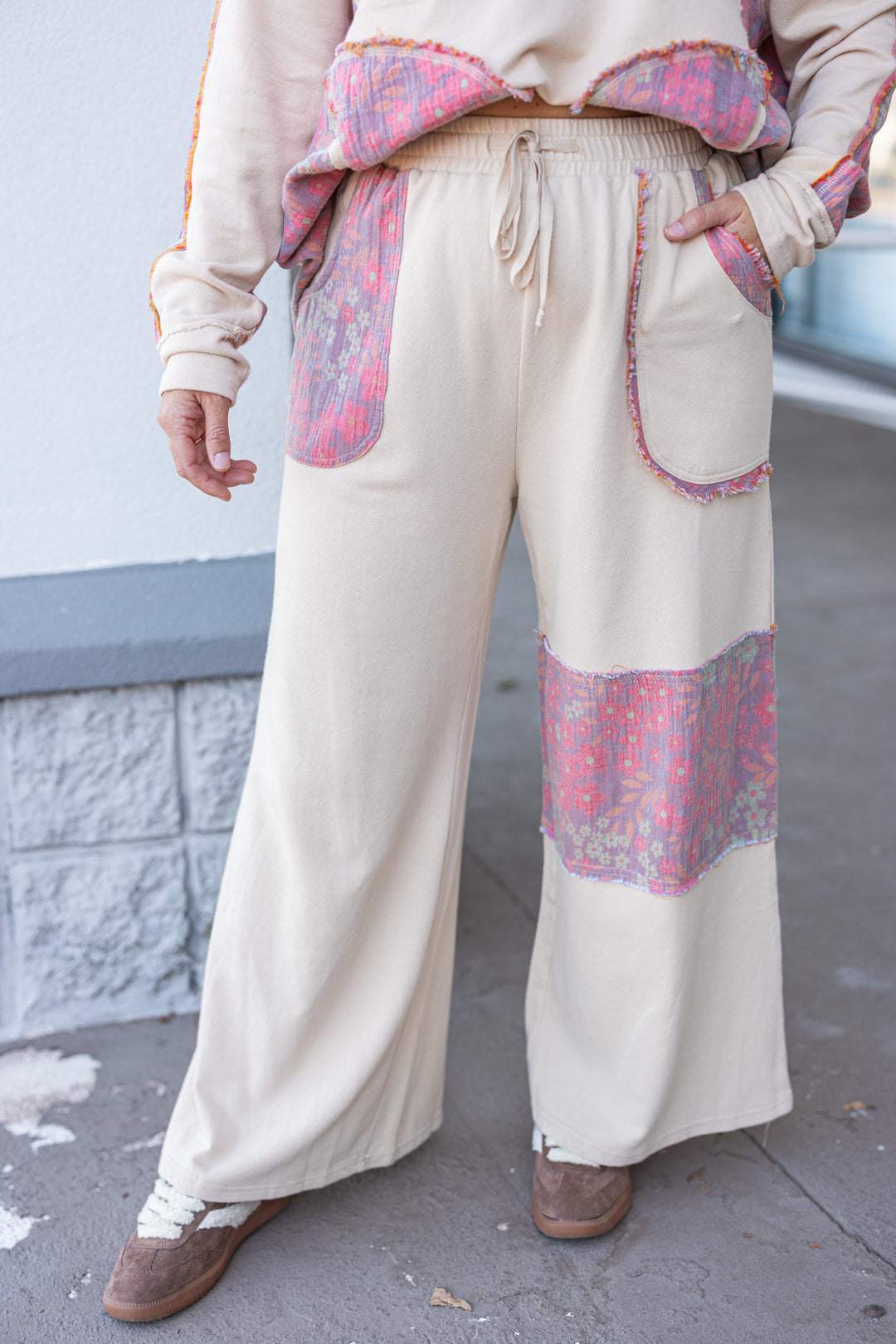 Women's french terry knit oatmeal pants with frayed floral patch gauze details by Easel