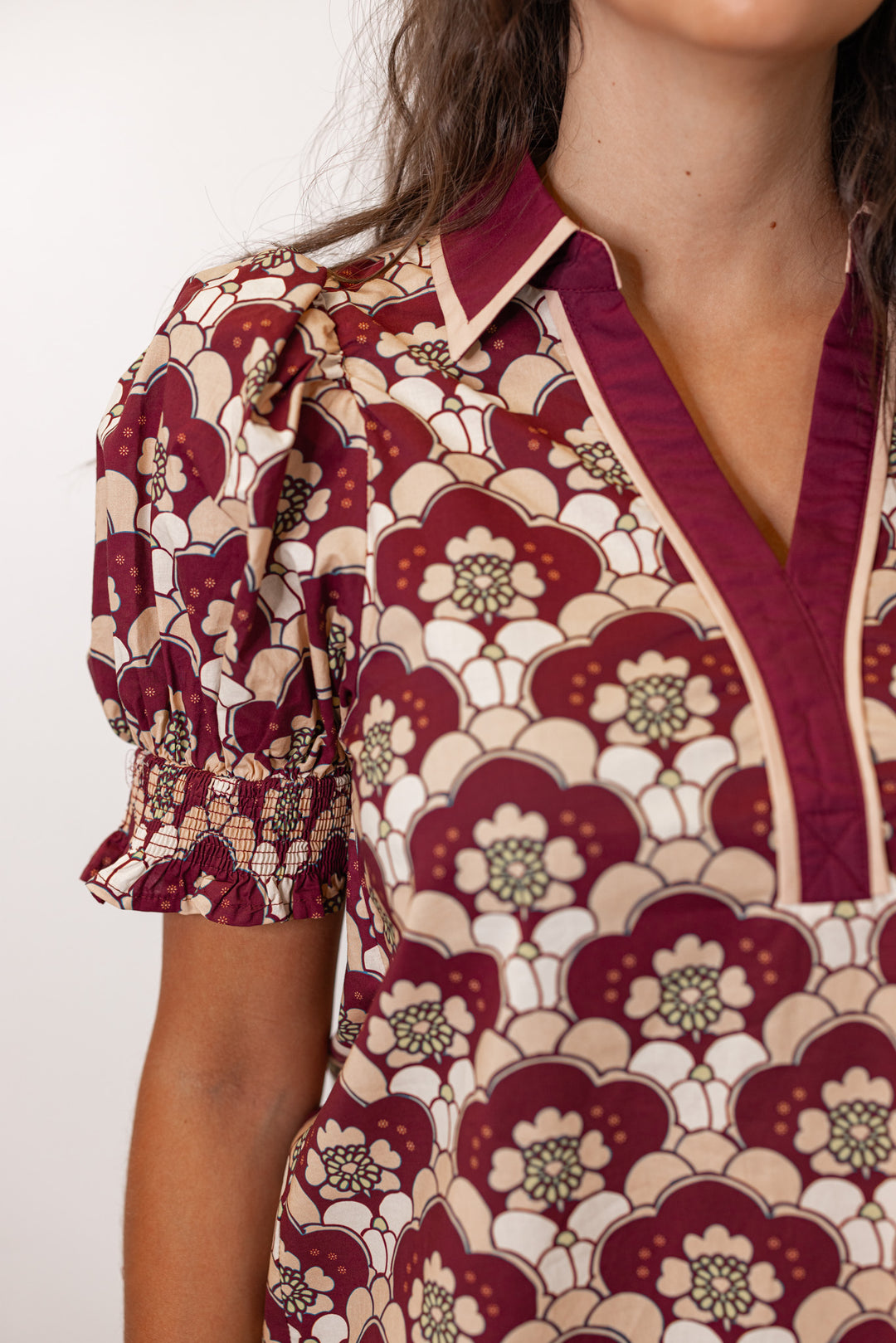 Short sleeve burgundy printed collared v neck blouse