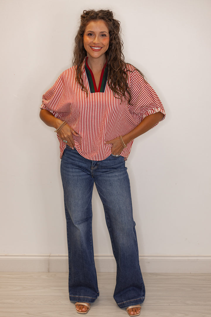 Women's brick red striped short sleeve top with color block detailed v neckline