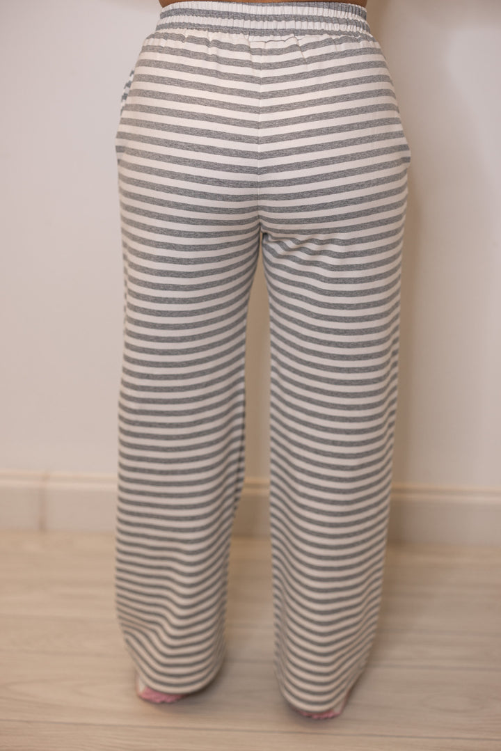 Women's grey striped lounge pants showing up close back view