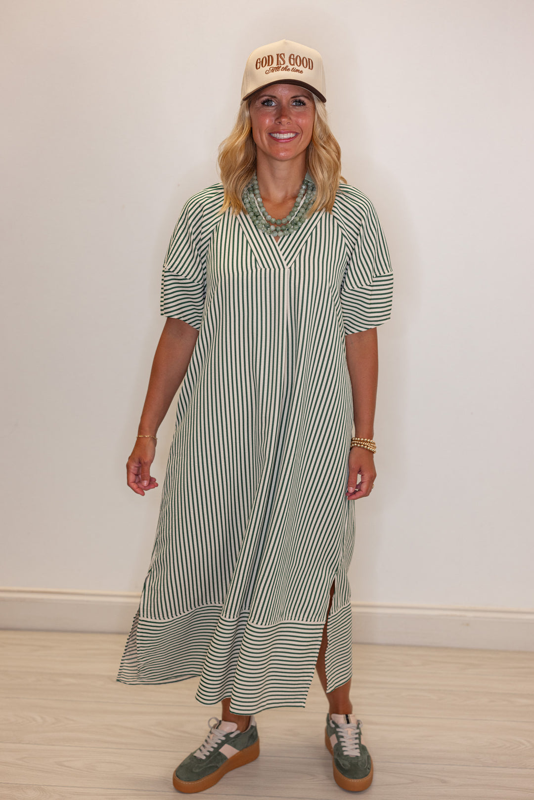 Women's hunter green and ivory striped midi dress by Entro showing full front view