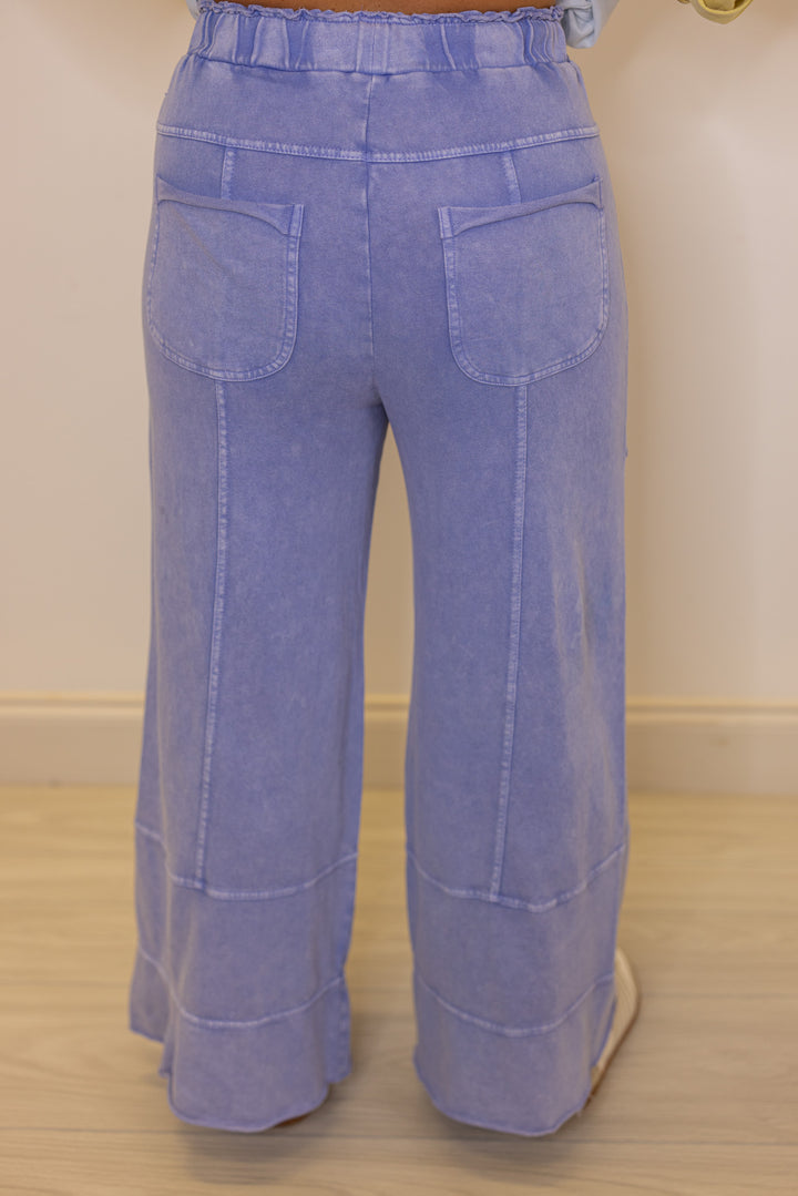 Women's French terry knit wide leg pants in mineral washed misty blue by Easel showing up close back view