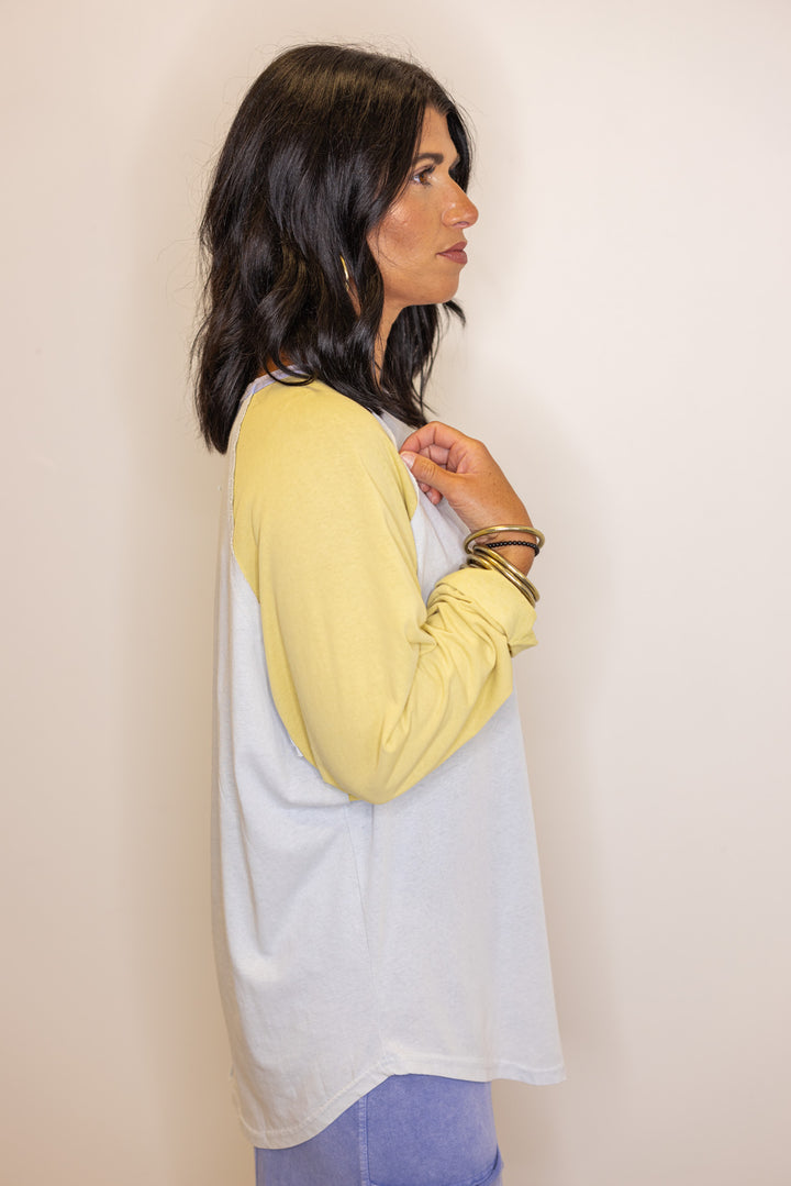 Women's light blue and dijon yellow colorblock knit top by Easel showing up close side view