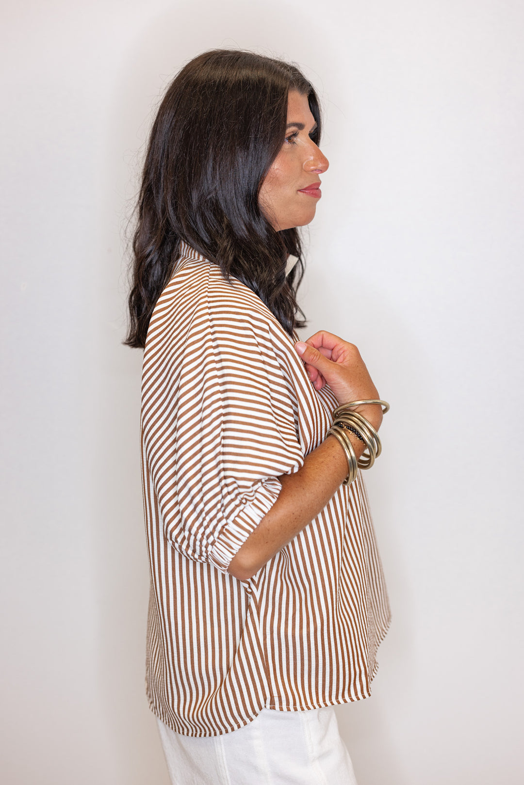 Women's caramel and ivory striped dolman top by Entro showing side view