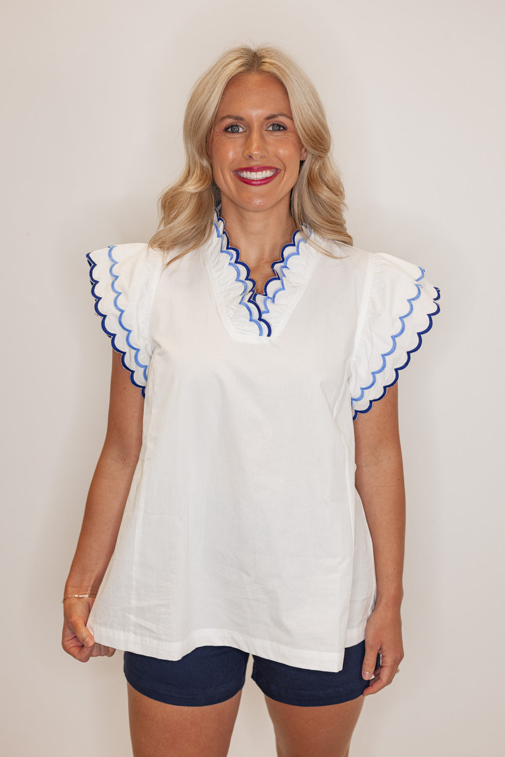 Women's summer off white poplin top with blue and navy scalloped trim by Umgee