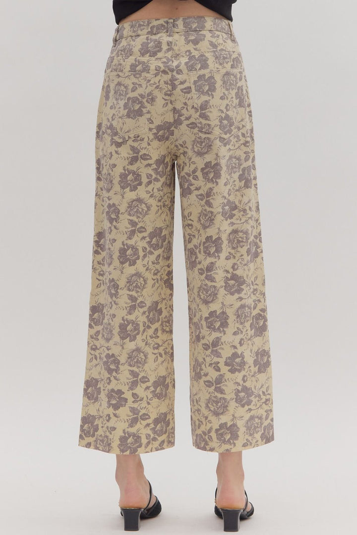 Women's ecru twill denim wide leg pants with washed lavender floral print showing back view