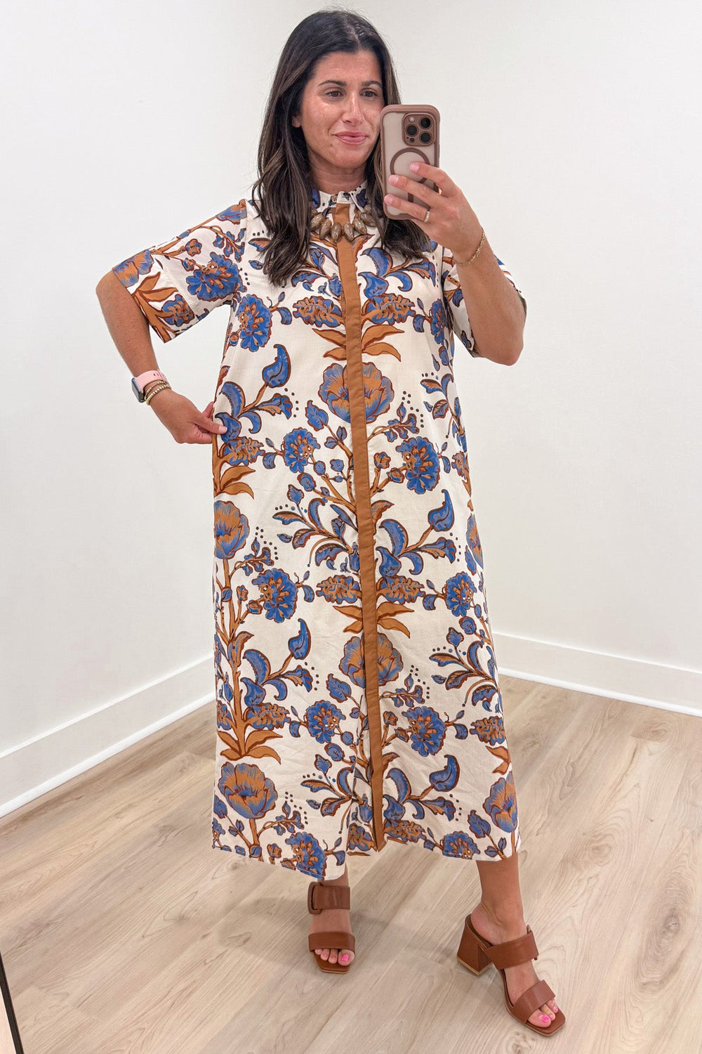ecru with blue and tan floral print short sleeve button front relaxed silhouette midi dress