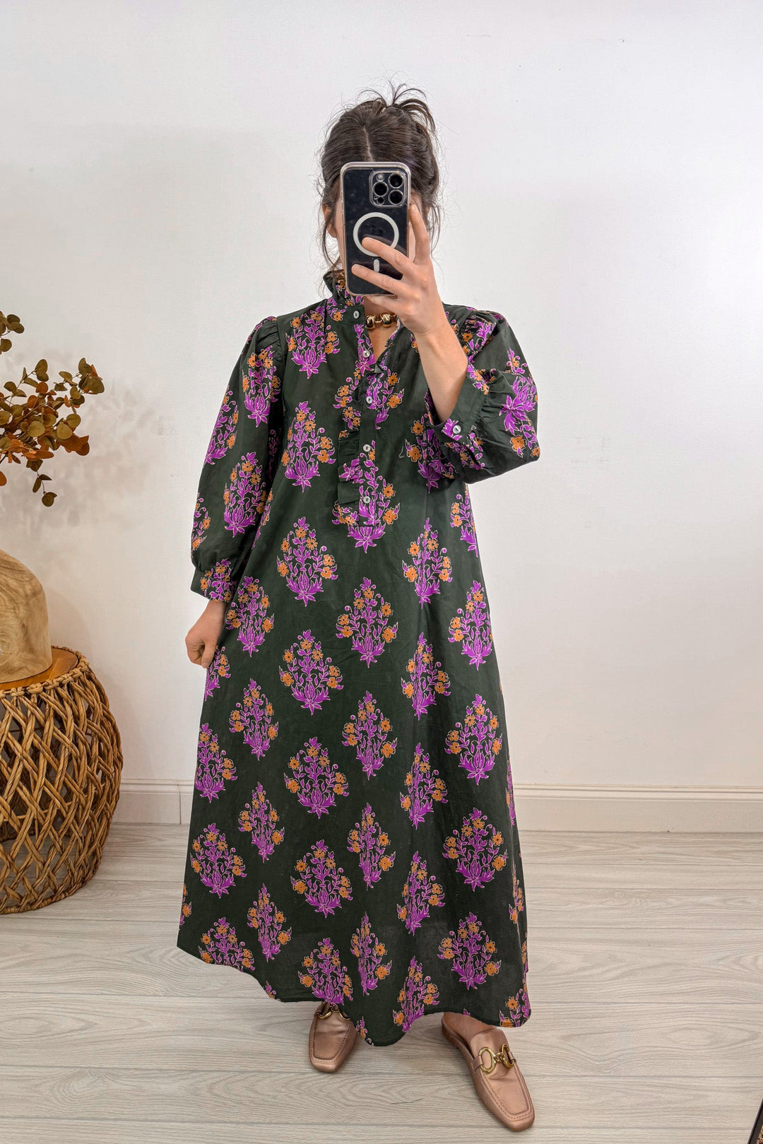 entro fall olive green floral midi dress holding out