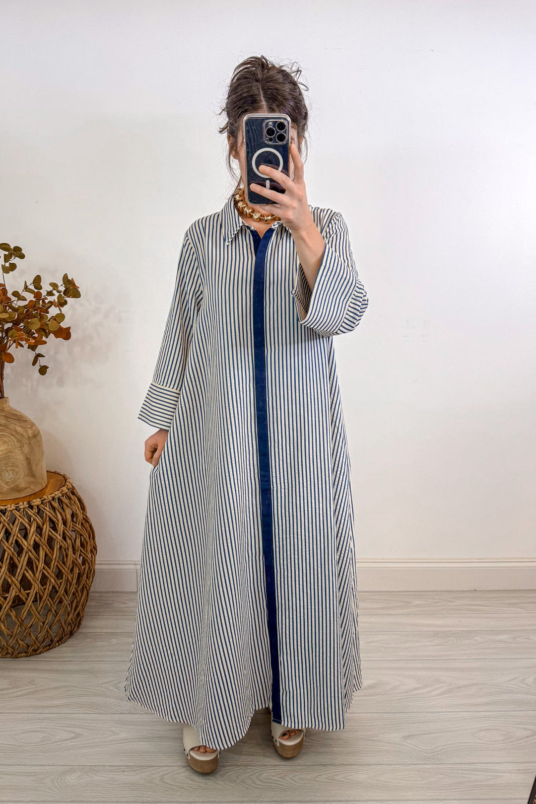 entro striped blue indigo maxi dress holding out 