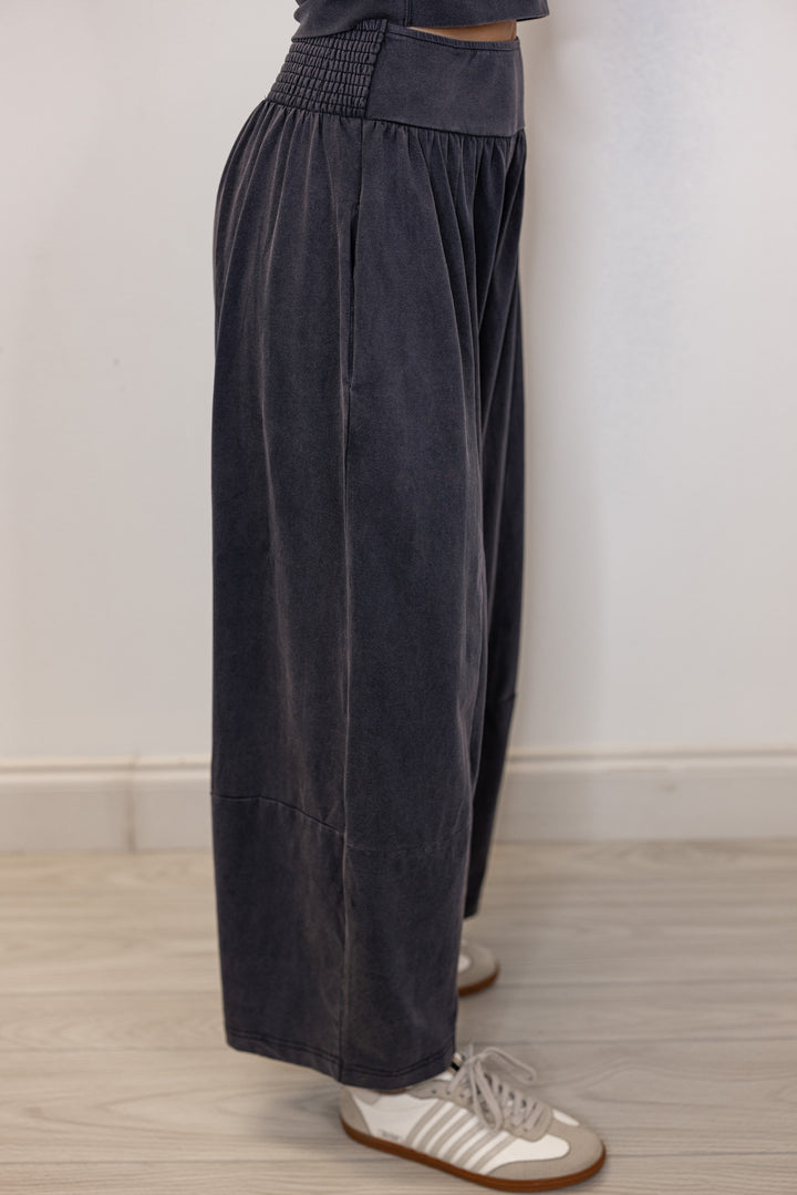 Women's ash black barrell pants and short sleeve top set by ee:some showing up close side view of pants
