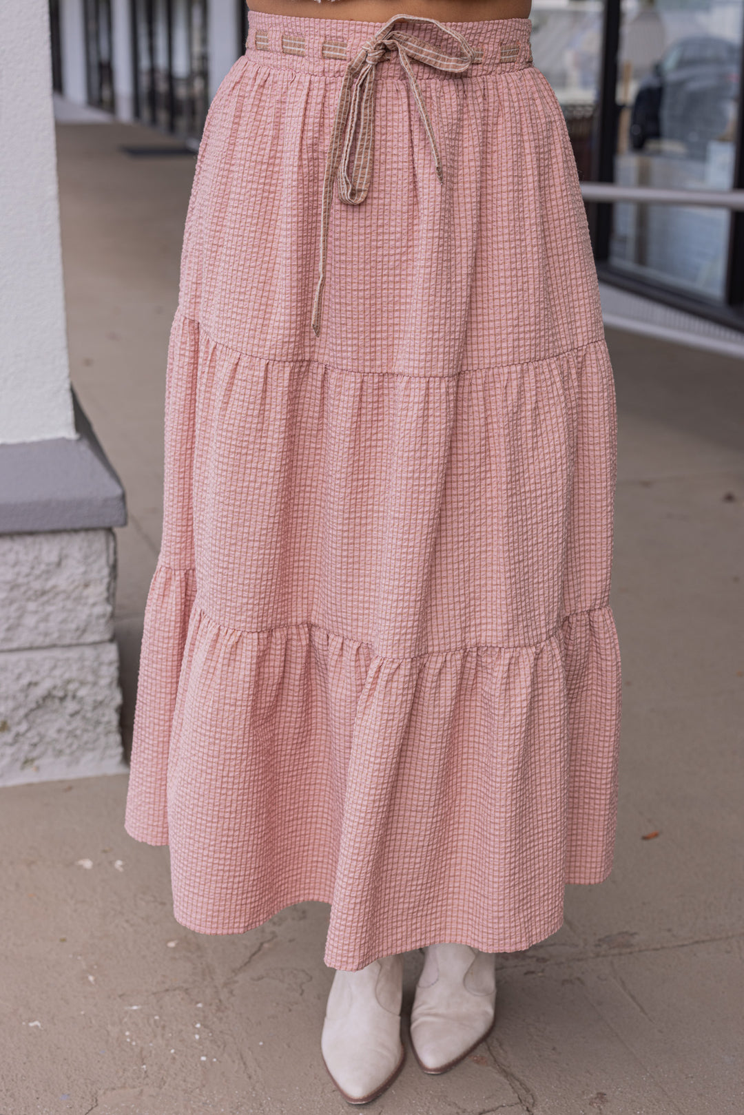 Women's mauve and mocha plaid print tiered midi skirt by Peach Love California showing up close front view