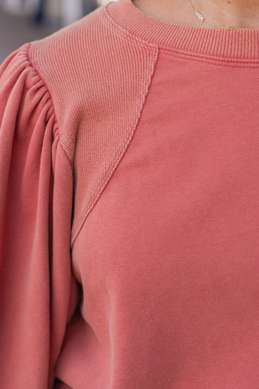 Mineral washed rust balloon sleeve pullover sweatshirt by Jodifl showing ribbed details