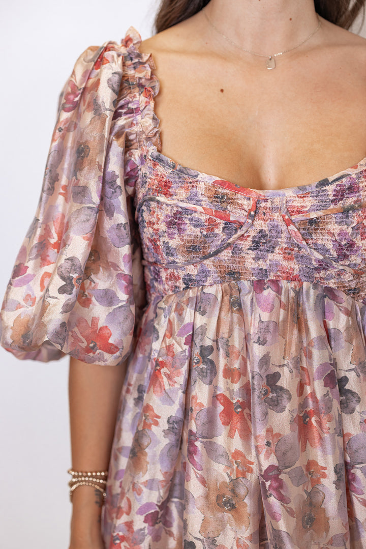 Women's champagne and multicolor floral chiffon midi dress with smocked bodice by Sofie the Label showing sweetheart neckline