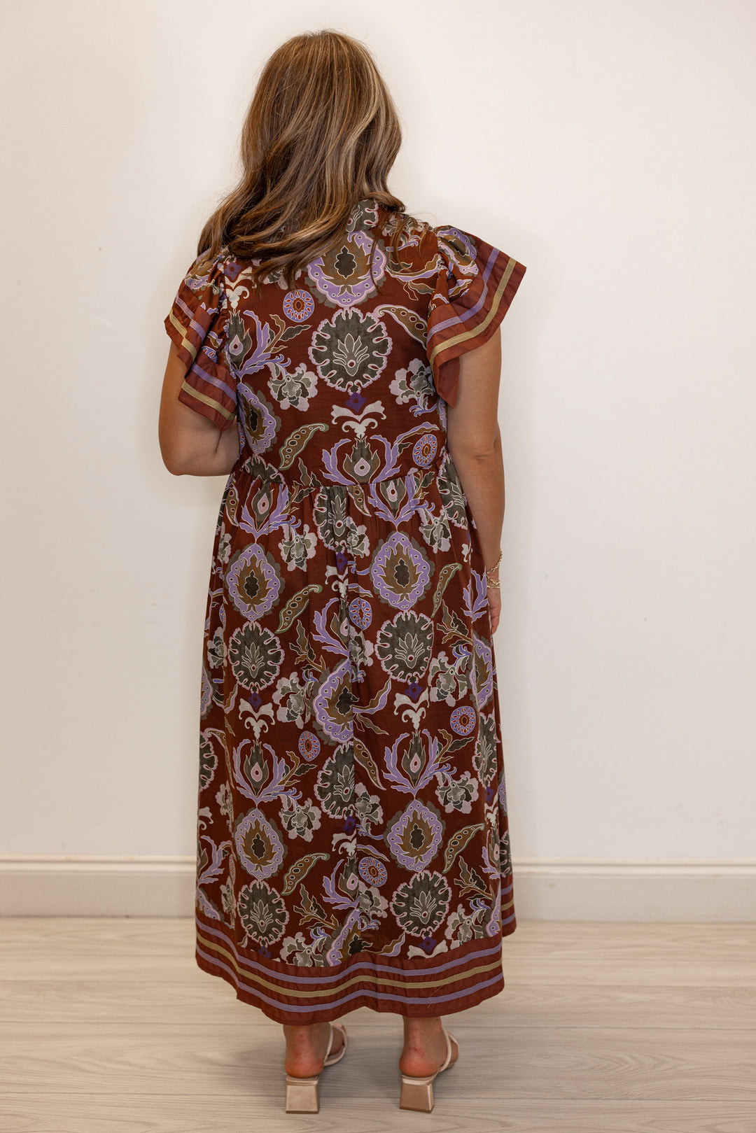 Women's red bean burgundy midi dress with multicolor abstract print by Entro showing full back view