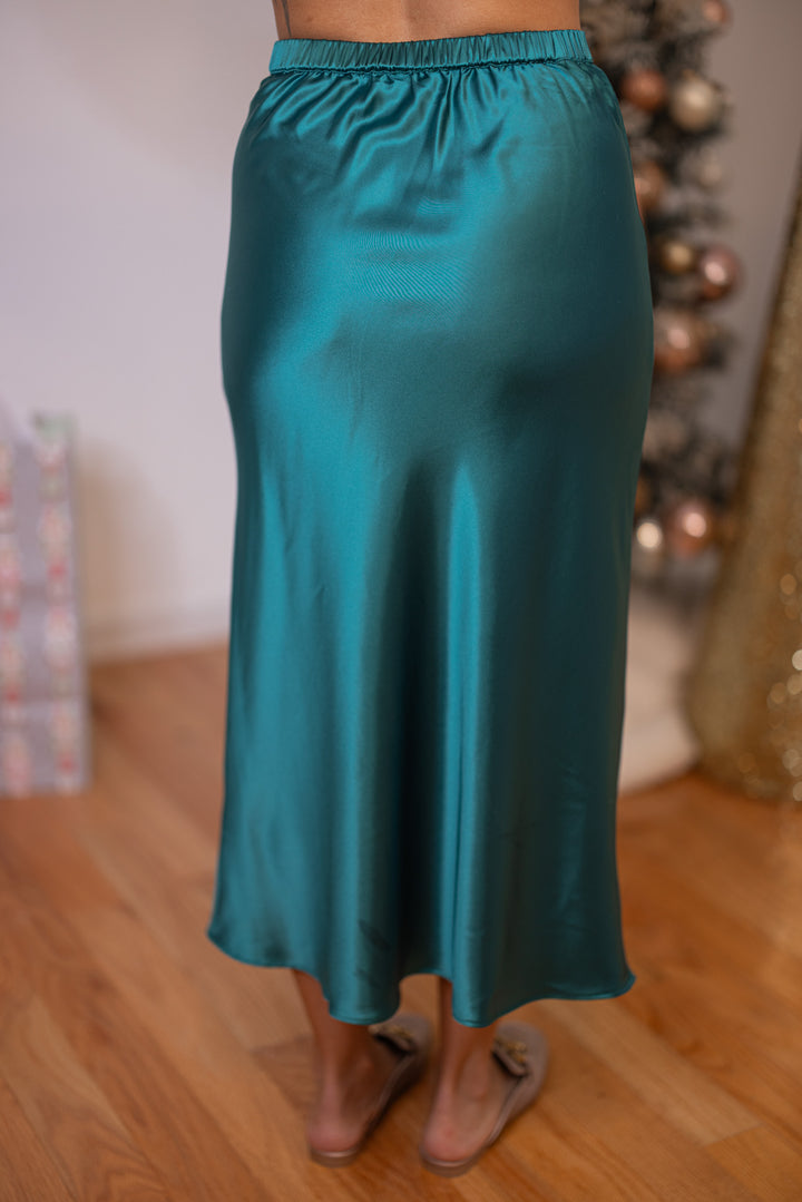 Women's green satin midi skirt by Wishlist showing back view