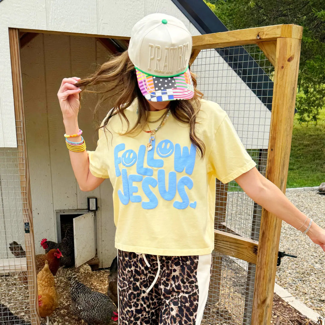 follow jesus puff crop yellow graphic tee