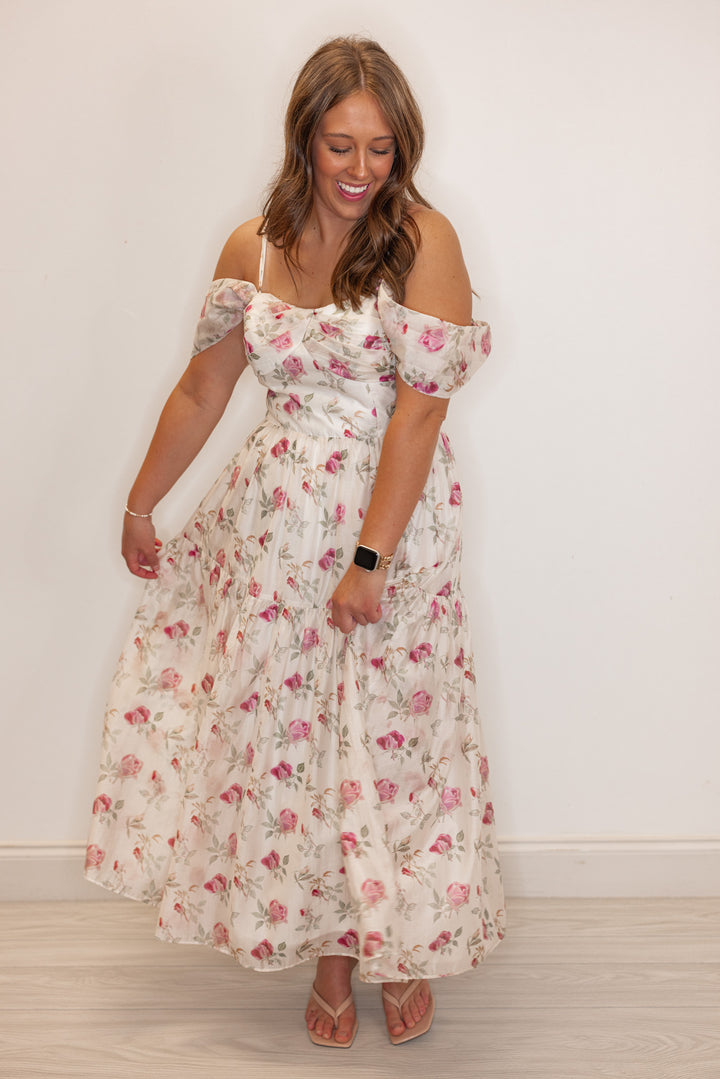 Off white with pink floral print event or wedding quest dress for women and teens. 