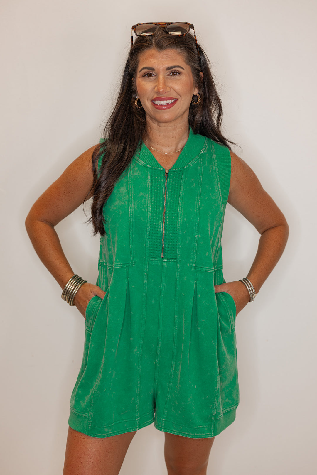 Women’s emerald green, easy fitting romper with pockets. 