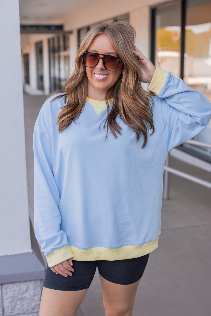 blue yellow trim pullover 